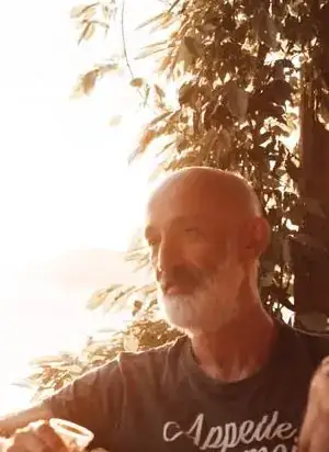 George, 70, relaxed in sunlight